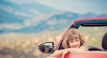 Happy Child Travel By Car In The Mountains